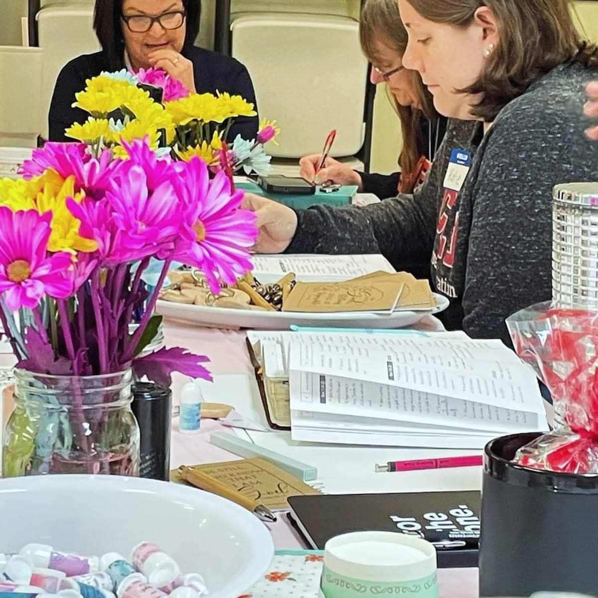 Women gathered around a Bible study table at Word of Grace