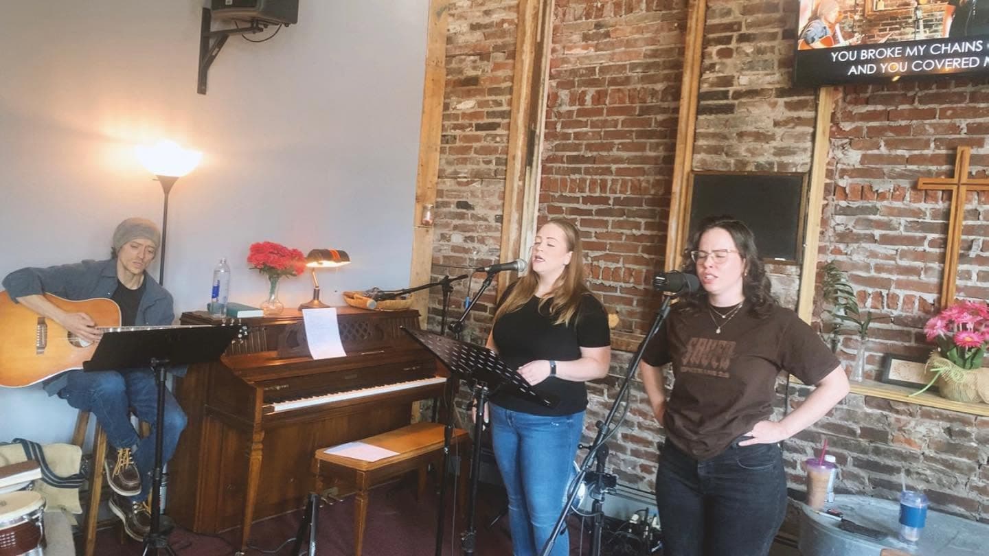 The Word of Grace worship team leading music